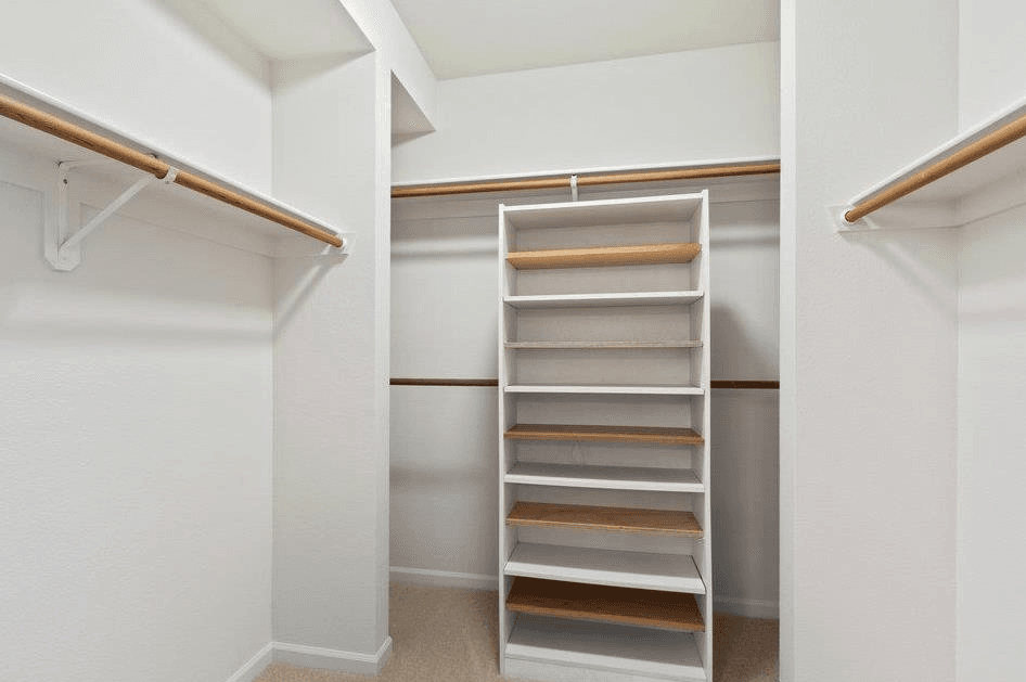 The Peninsula Regent - Unit 203 - Walk-in closet with built-in shelves