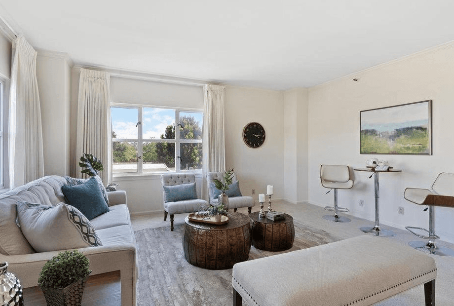 The Peninsula Regent - Unit 203 - Carpeted living room