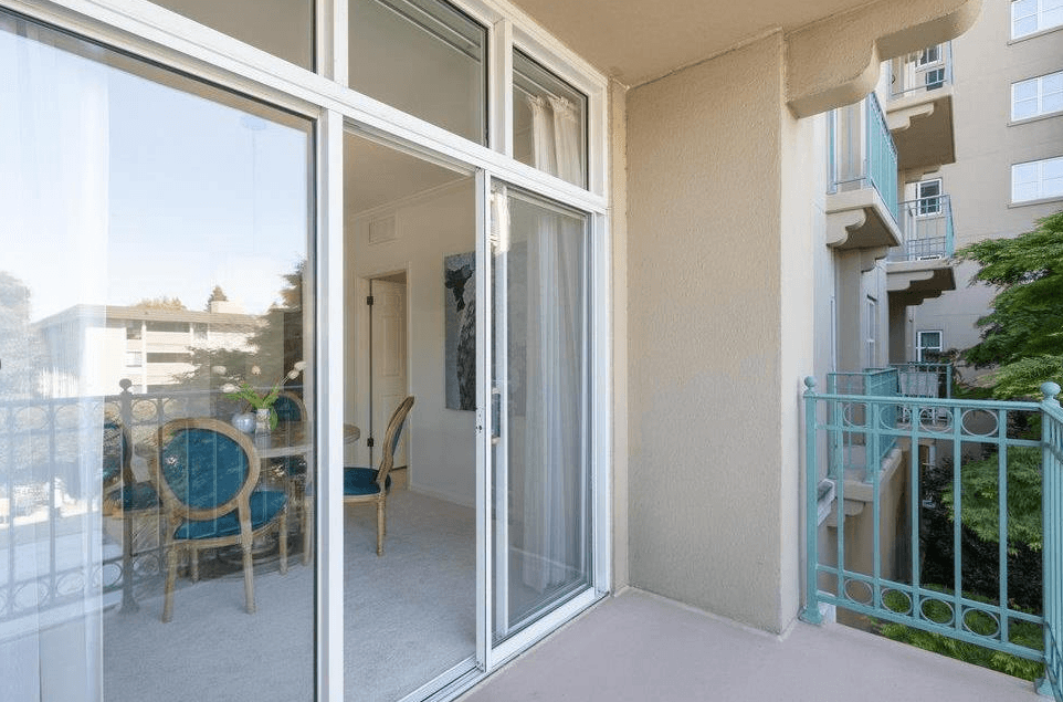 Unit 203 - Balcony with blue railing